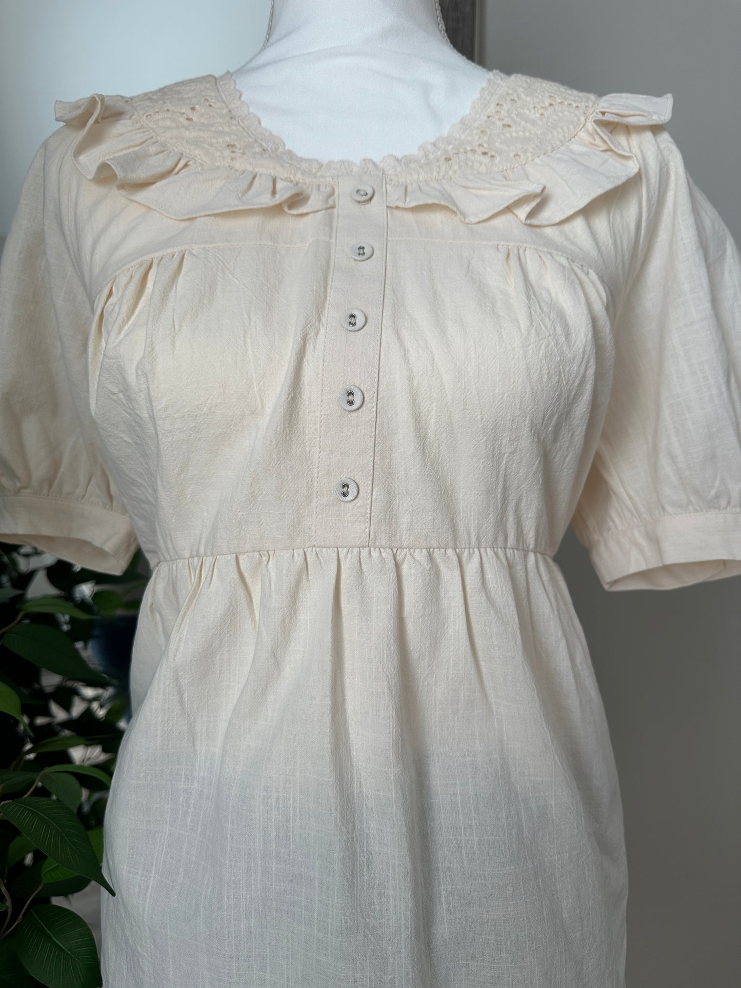 Faux Button Baby doll Top with a Lace Ruffle Peter Pan Collar | Cream