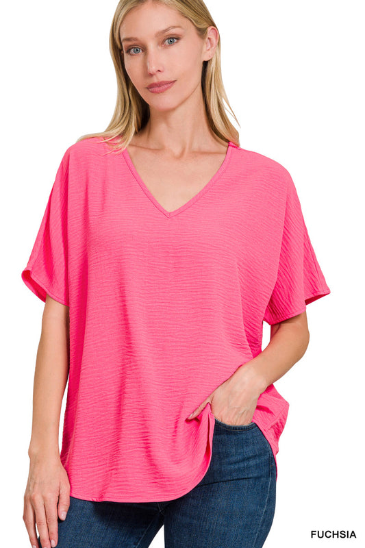 WOVEN AIRFLOW V-NECK SHORT SLEEVE TOP - FUCHIA